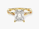 Gold twisted band engagement ring with radiant cut diamond