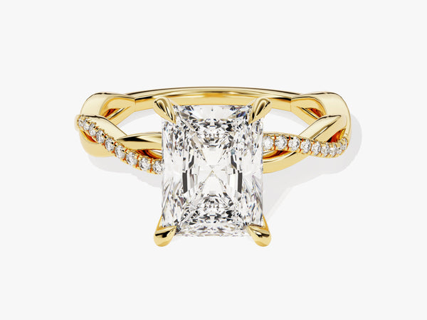 Gold twisted band engagement ring with radiant cut diamond