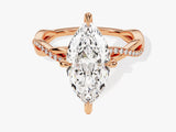 Rose gold marquise diamond engagement ring with pave band
