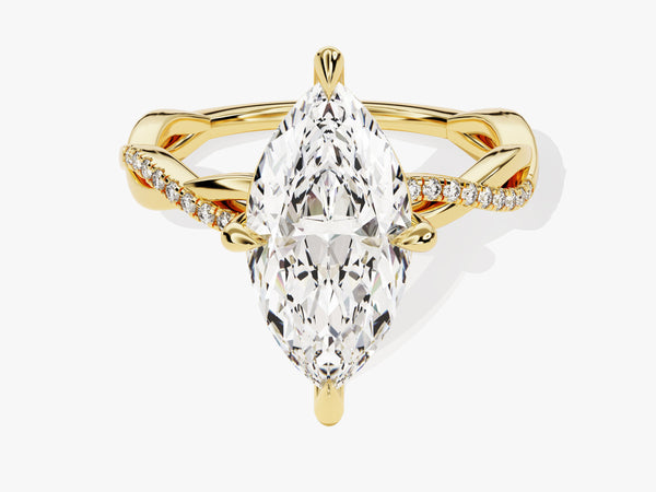 Marquise diamond engagement ring with twisted gold band and pave diamonds