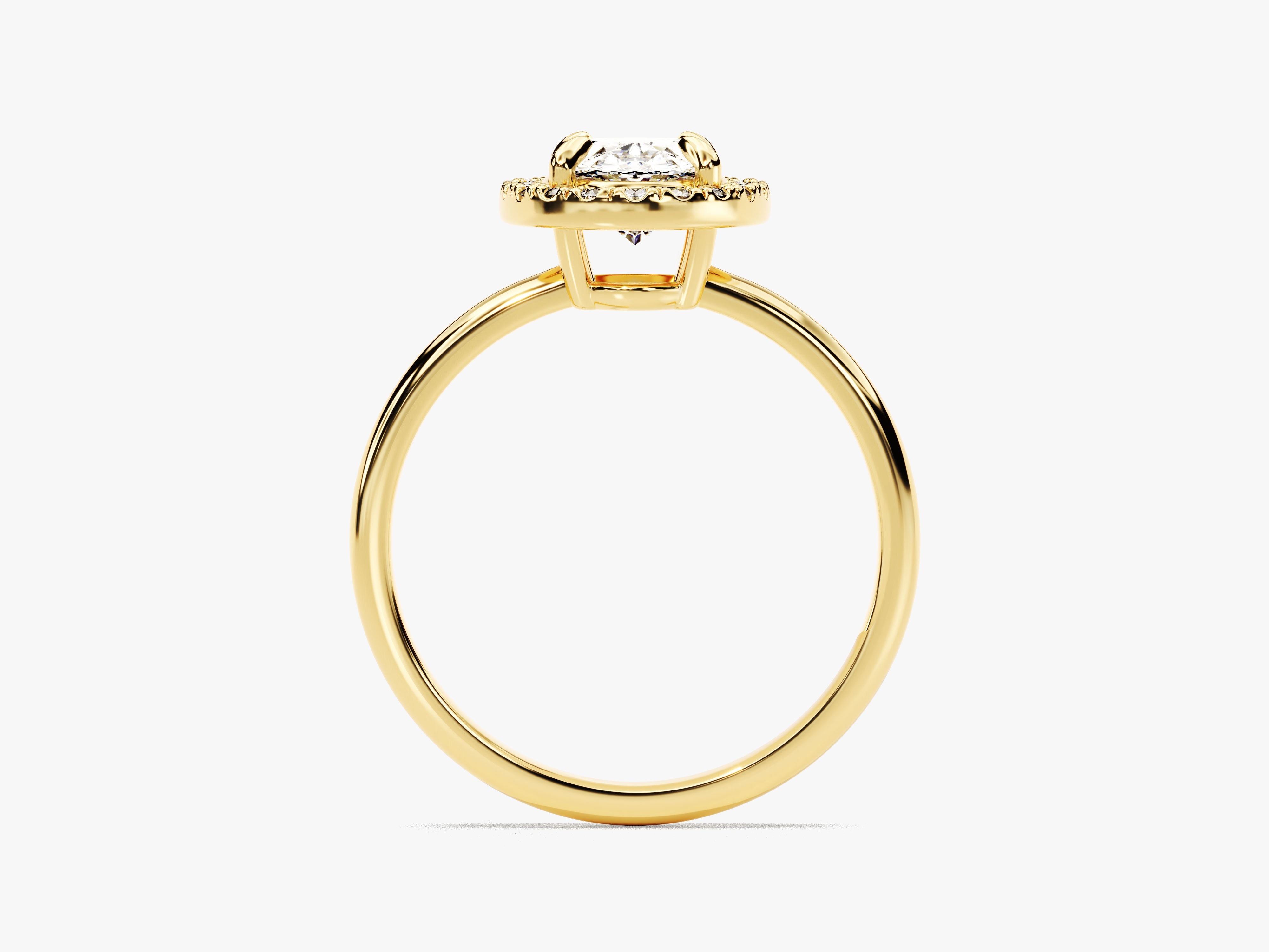 Gold halo engagement ring with diamond center stone