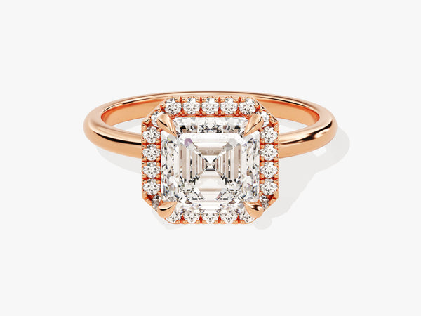 Rose gold halo ring with emerald cut diamond engagement ring