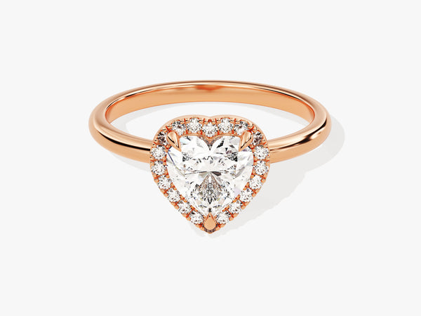 Rose gold pear-shaped diamond engagement ring with halo