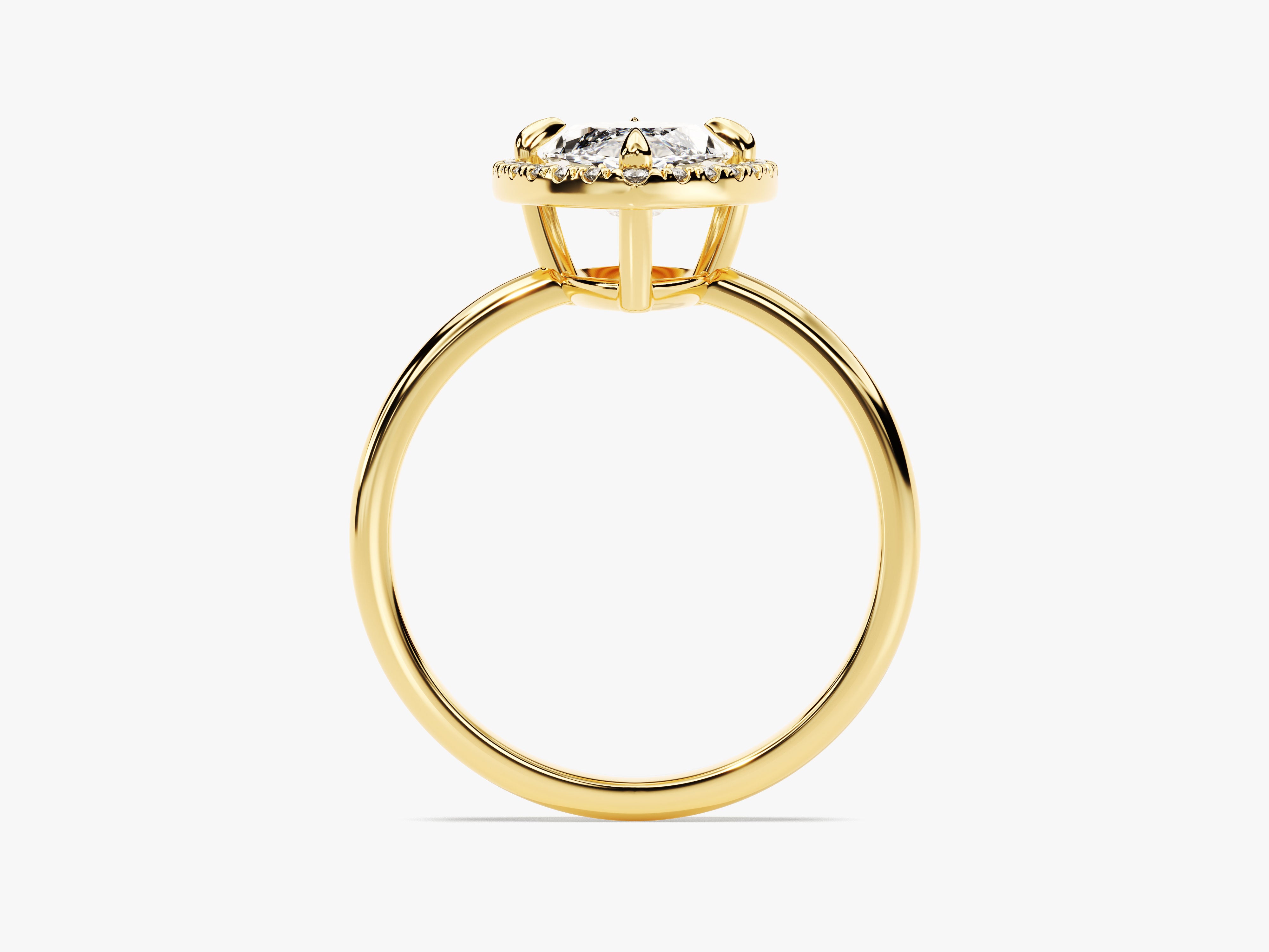Gold halo ring with a large diamond engagement ring