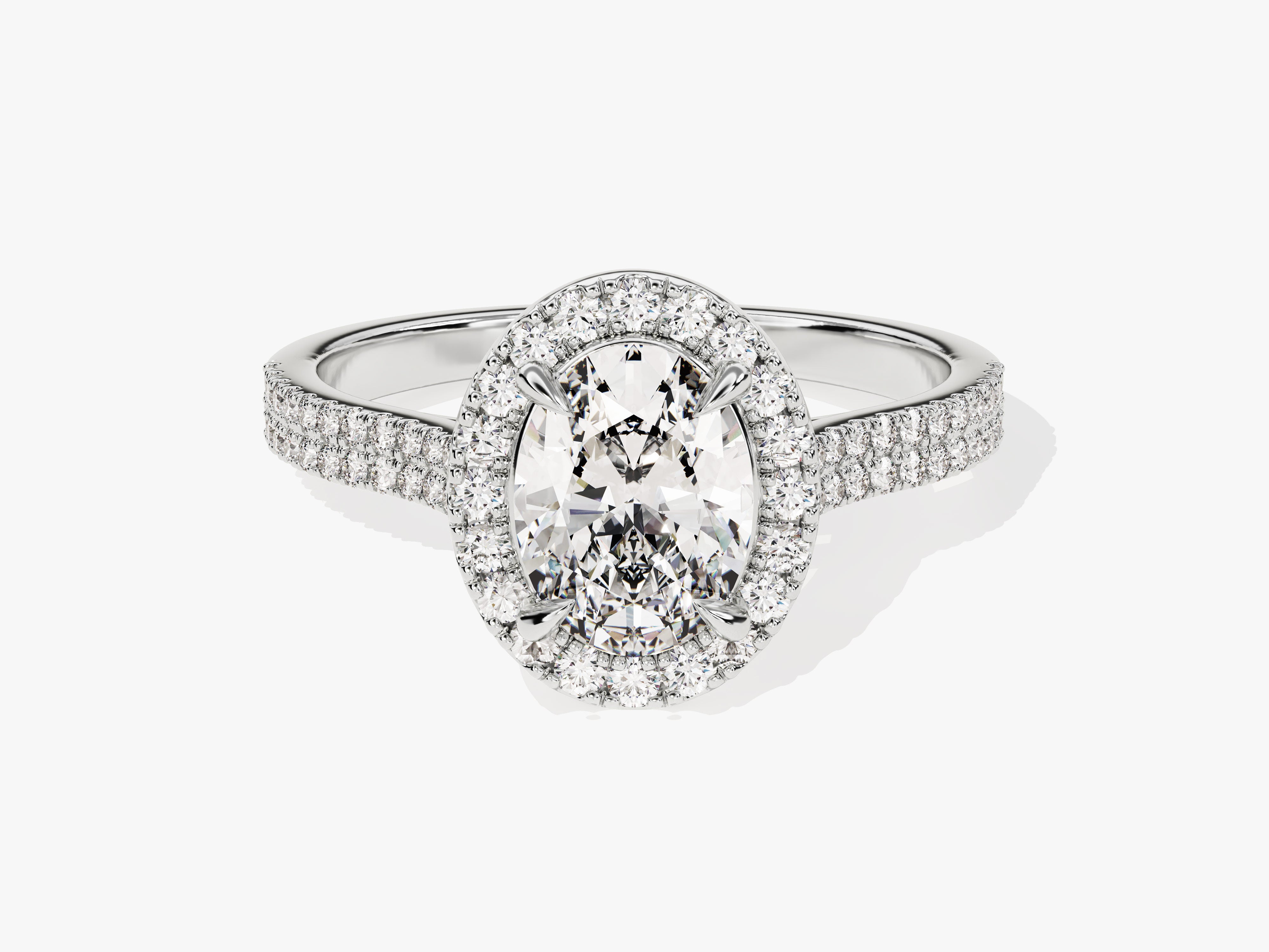 Oval diamond engagement ring with pave band
