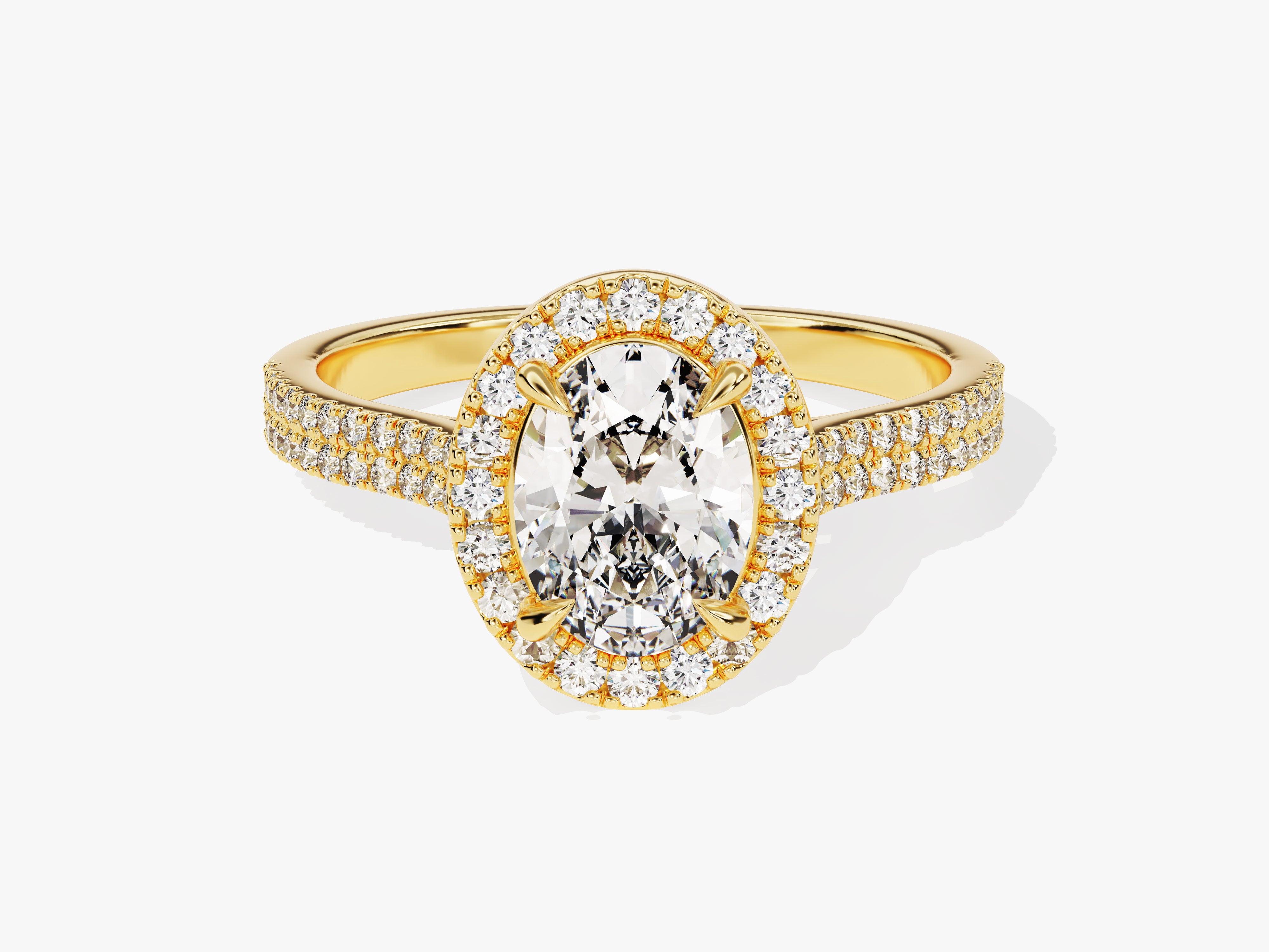 Gold oval diamond halo ring with pave band