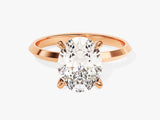 Oval diamond engagement ring in rose gold setting