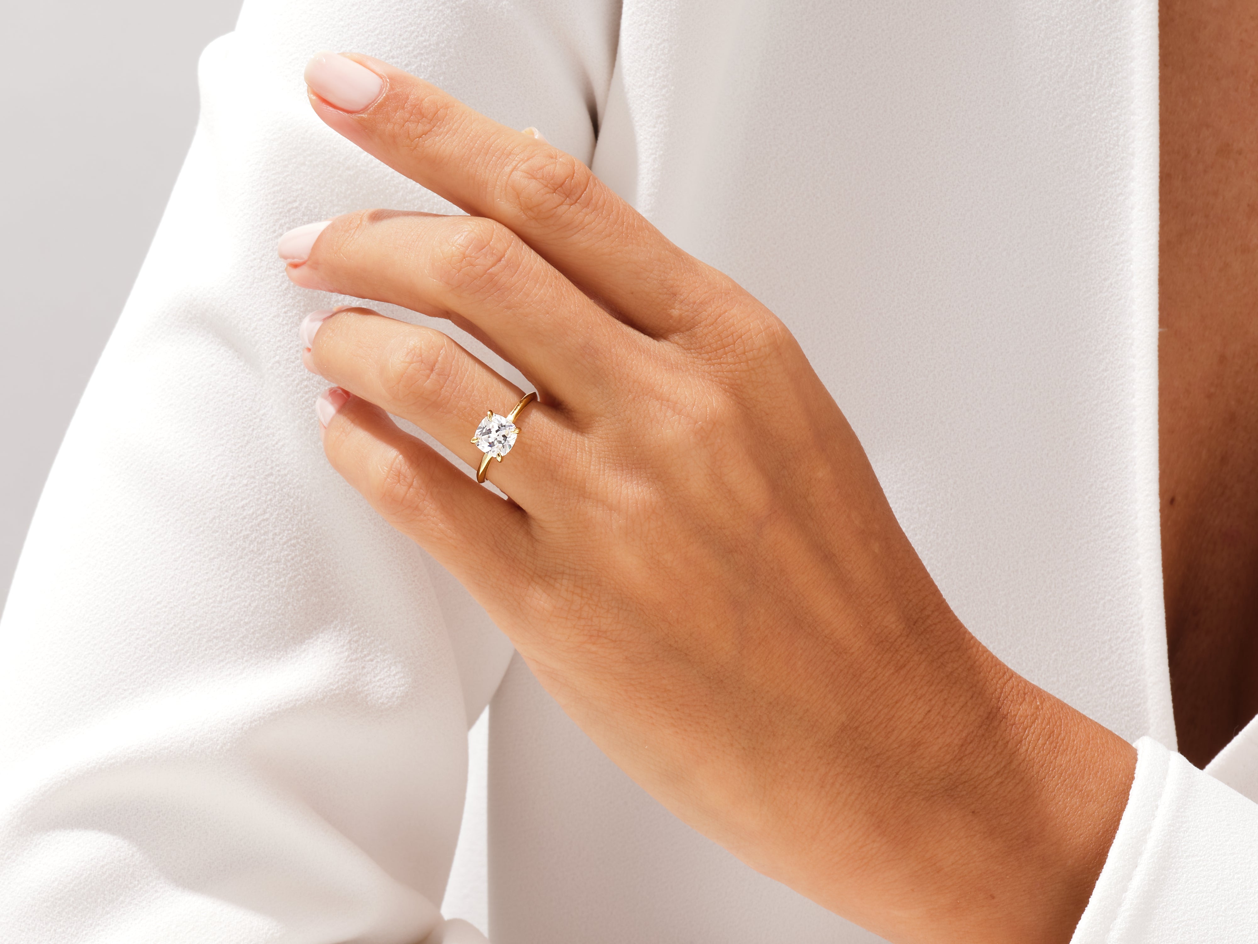 Gold ring with diamond on hand, jewelry photography