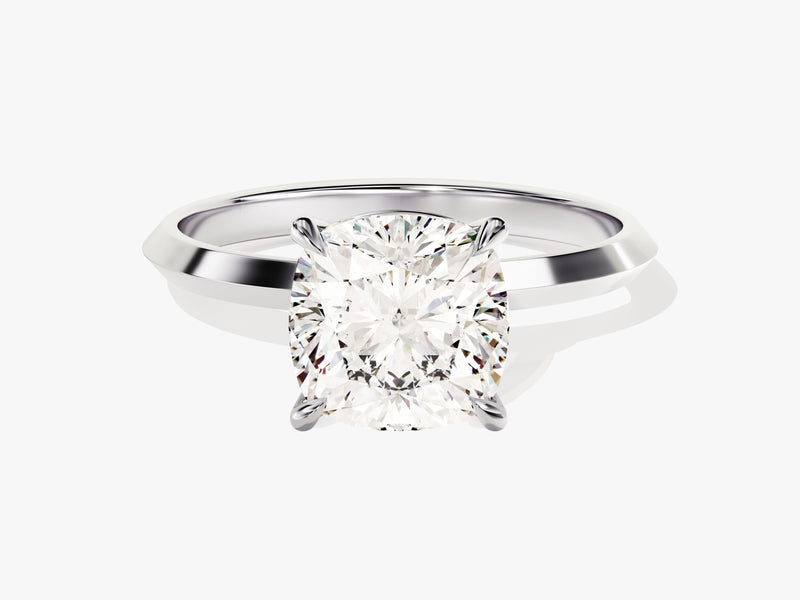 Cushion cut diamond engagement ring in platinum setting