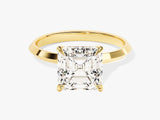 Gold ring with emerald-cut diamond engagement ring