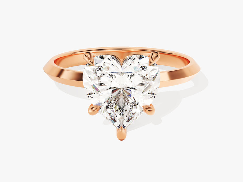 Rose gold ring with a heart-shaped diamond engagement ring