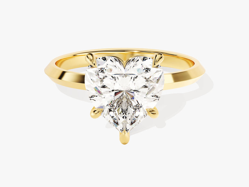 Heart-shaped diamond engagement ring in yellow gold