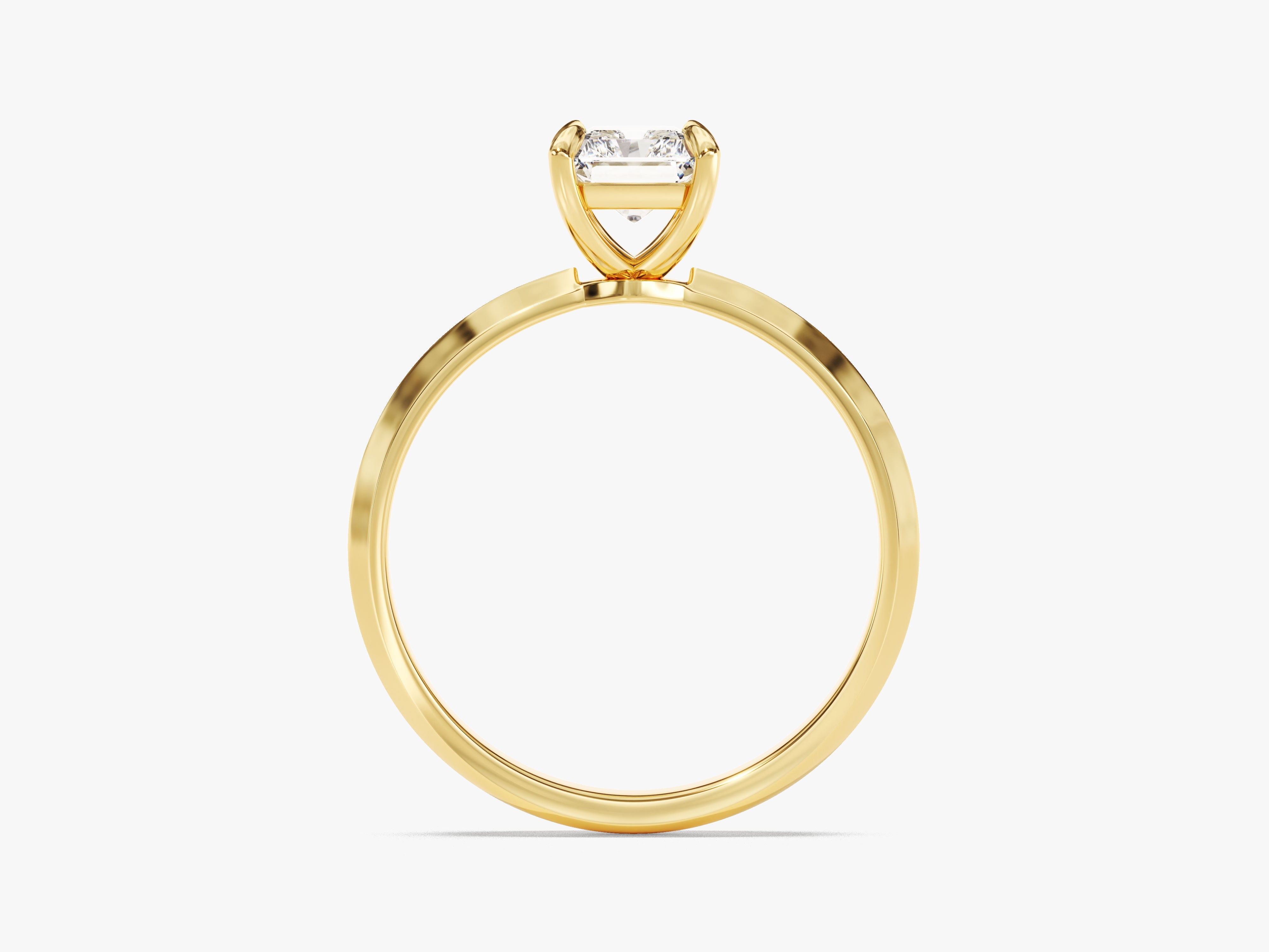 Gold ring with emerald-cut diamond engagement ring