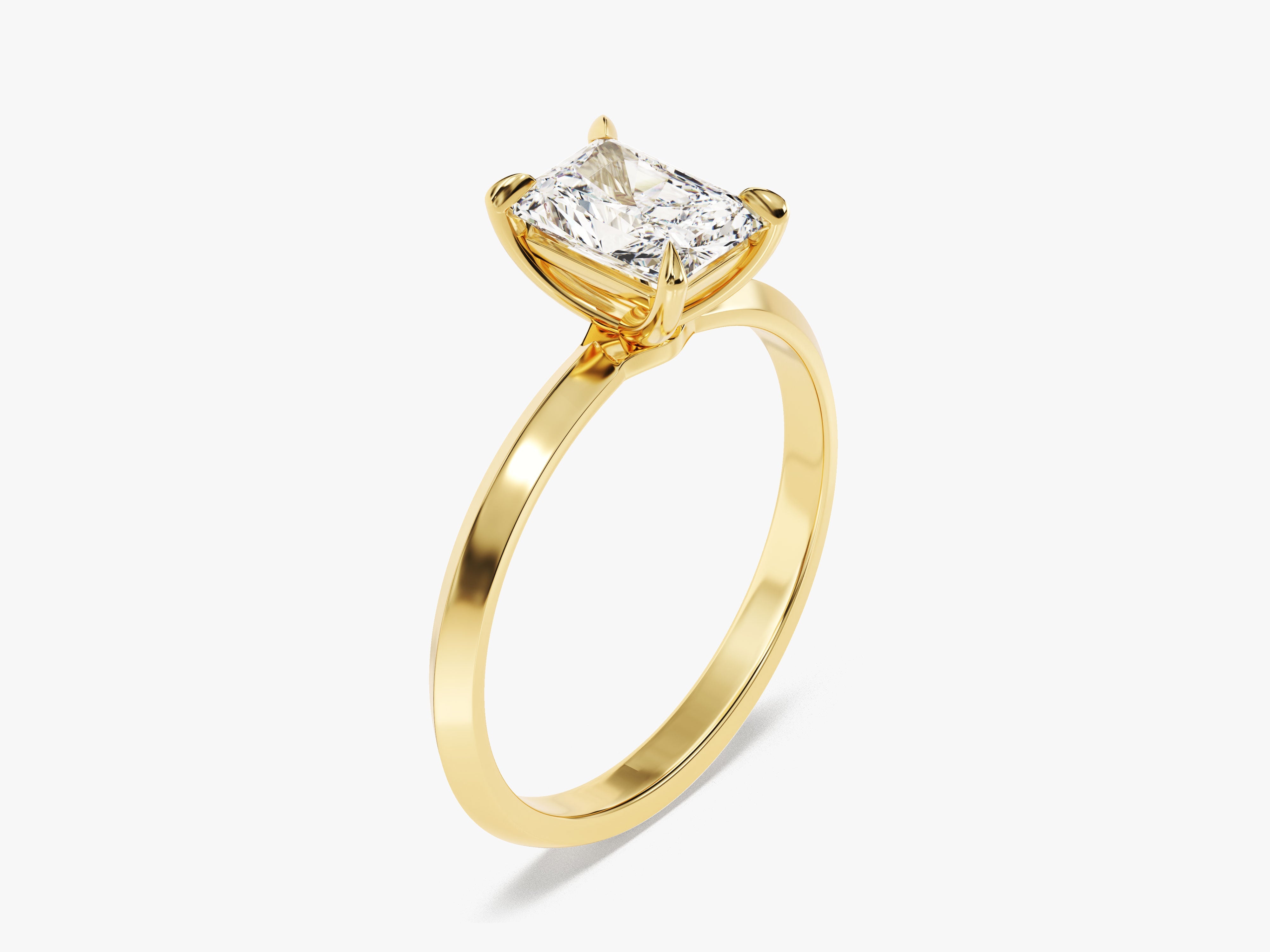Gold ring with radiant cut diamond engagement ring