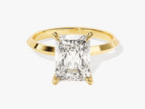 Radiant cut diamond engagement ring in yellow gold