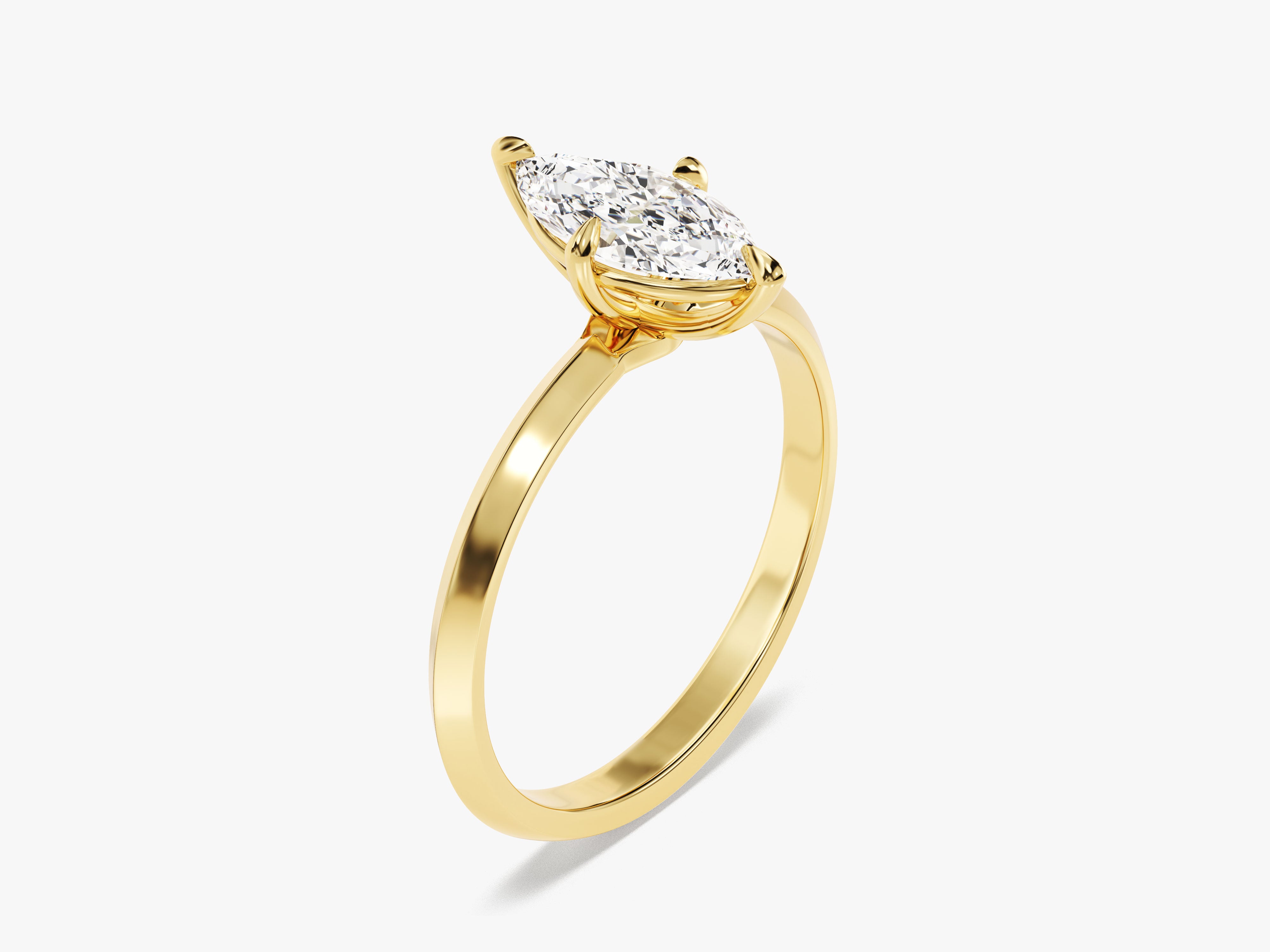 Marquise diamond engagement ring in yellow gold