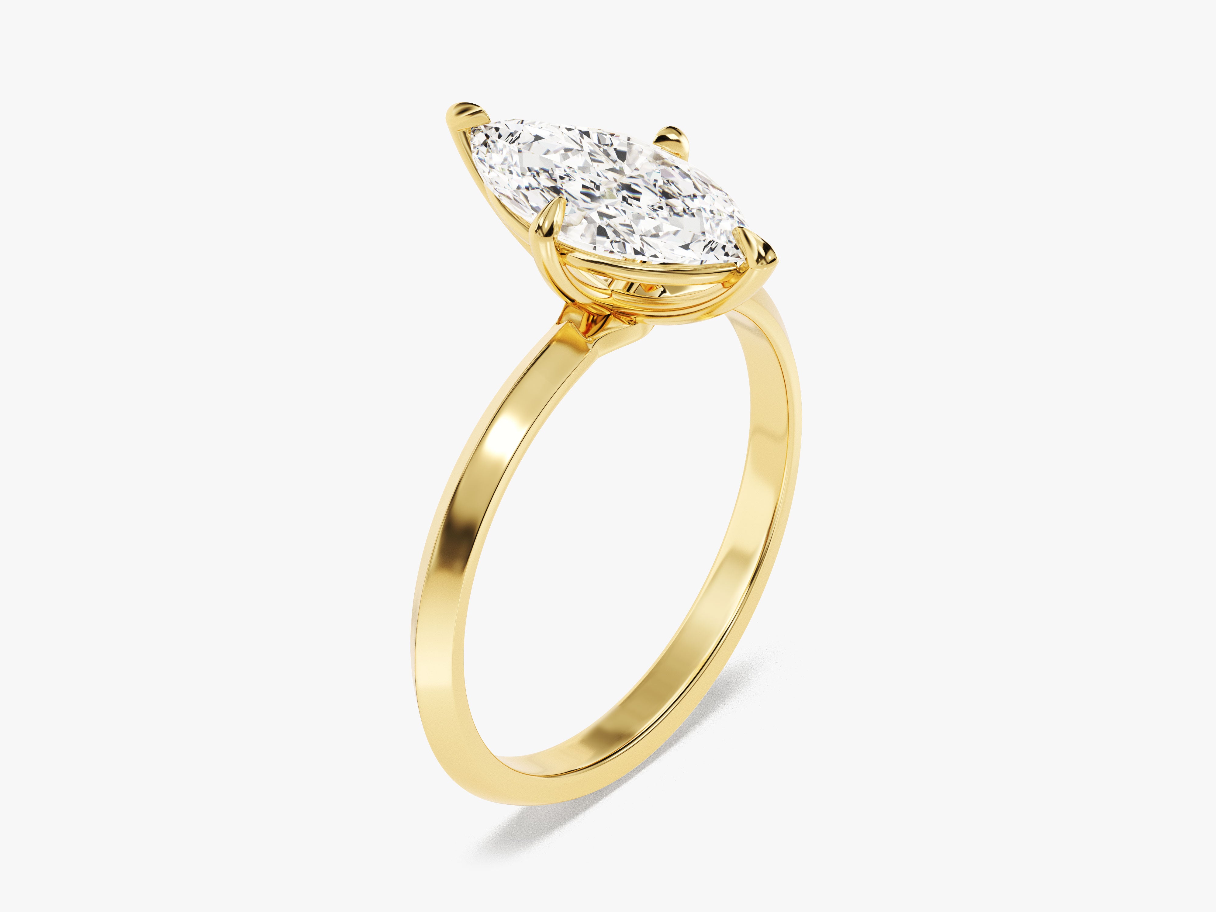 Marquise diamond engagement ring in yellow gold