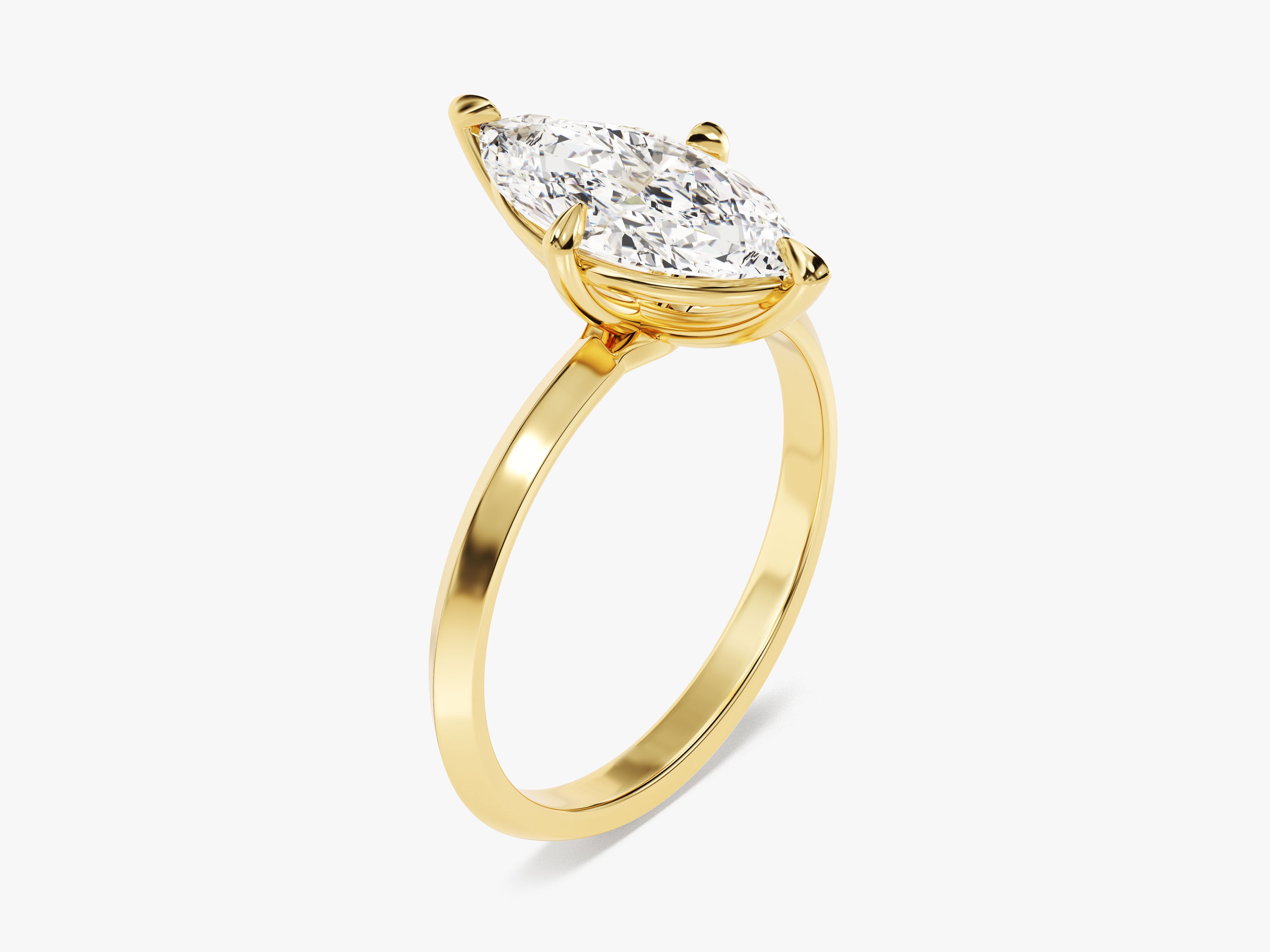 Marquise diamond engagement ring in yellow gold