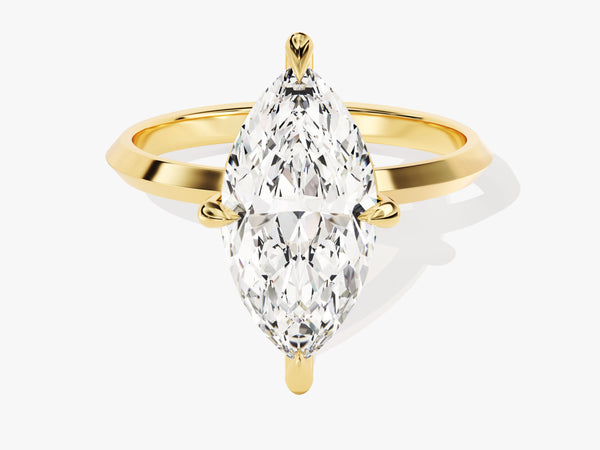 Marquise diamond engagement ring in yellow gold