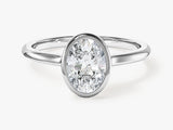Bezel Oval Lab Grown Diamond Engagement Ring (1.50 CT)