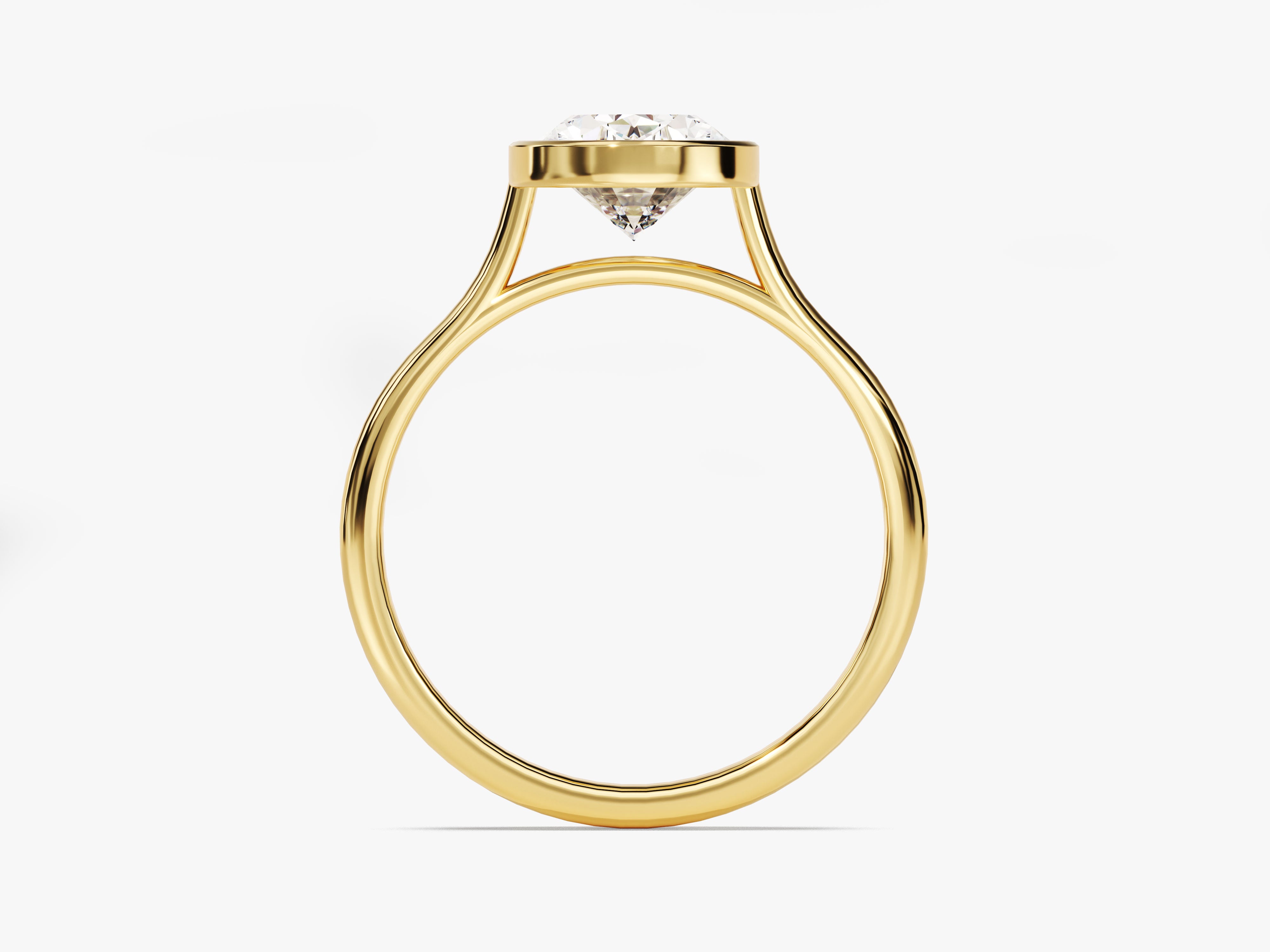 Gold bezel set diamond engagement ring from jewelry firm