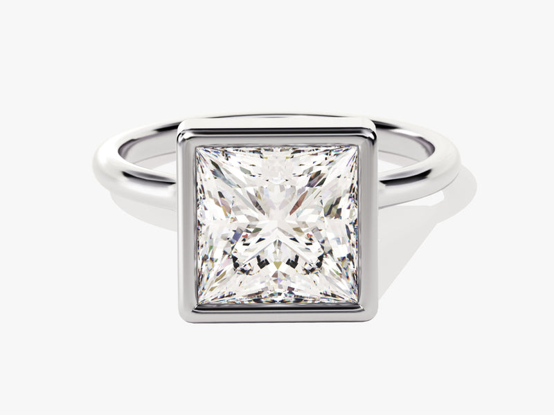 Princess cut diamond engagement ring in a bezel setting