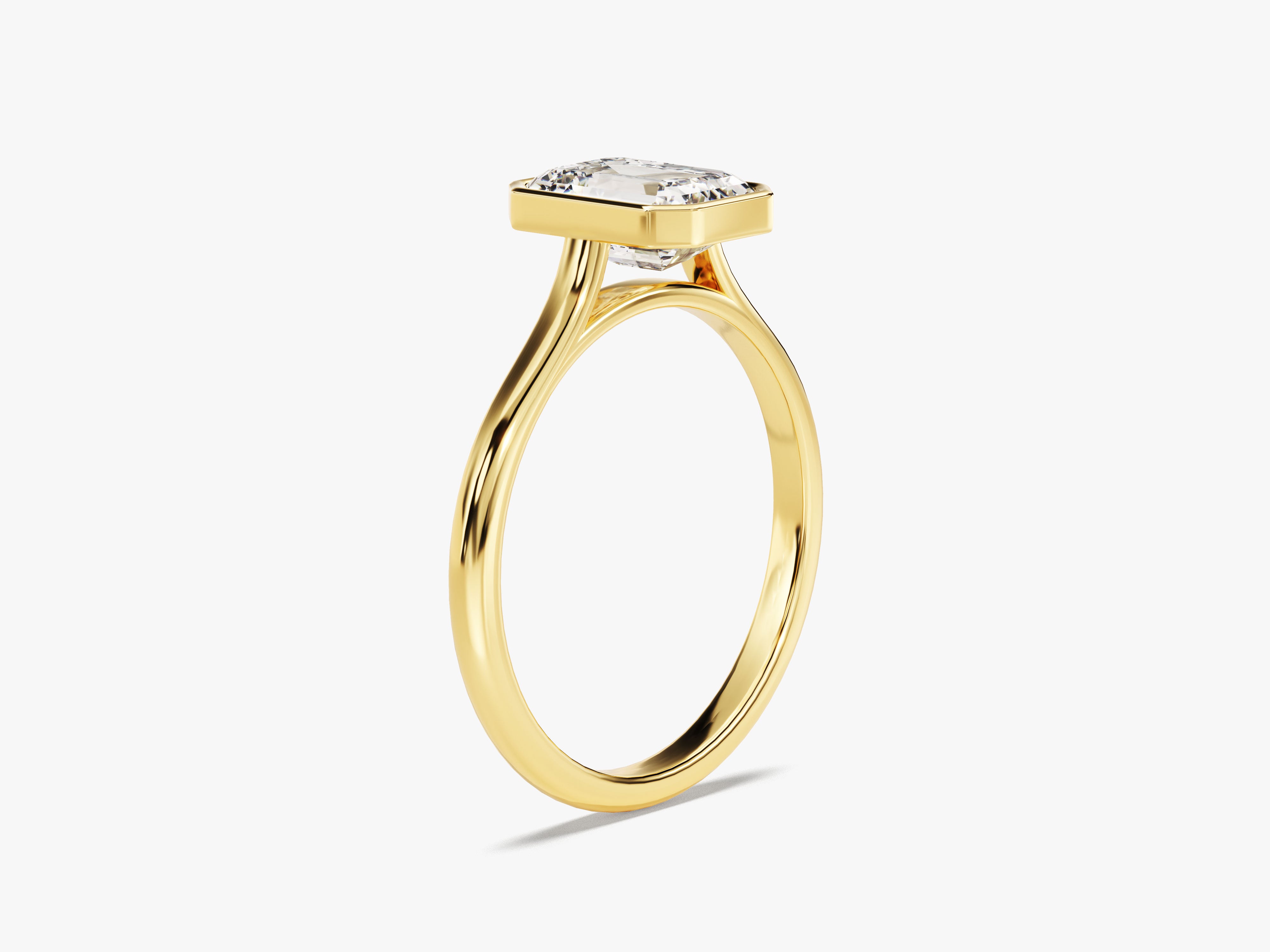 Gold ring with emerald cut diamond, fine jewelry