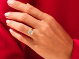 Emerald cut diamond ring on a hand, luxury jewelry