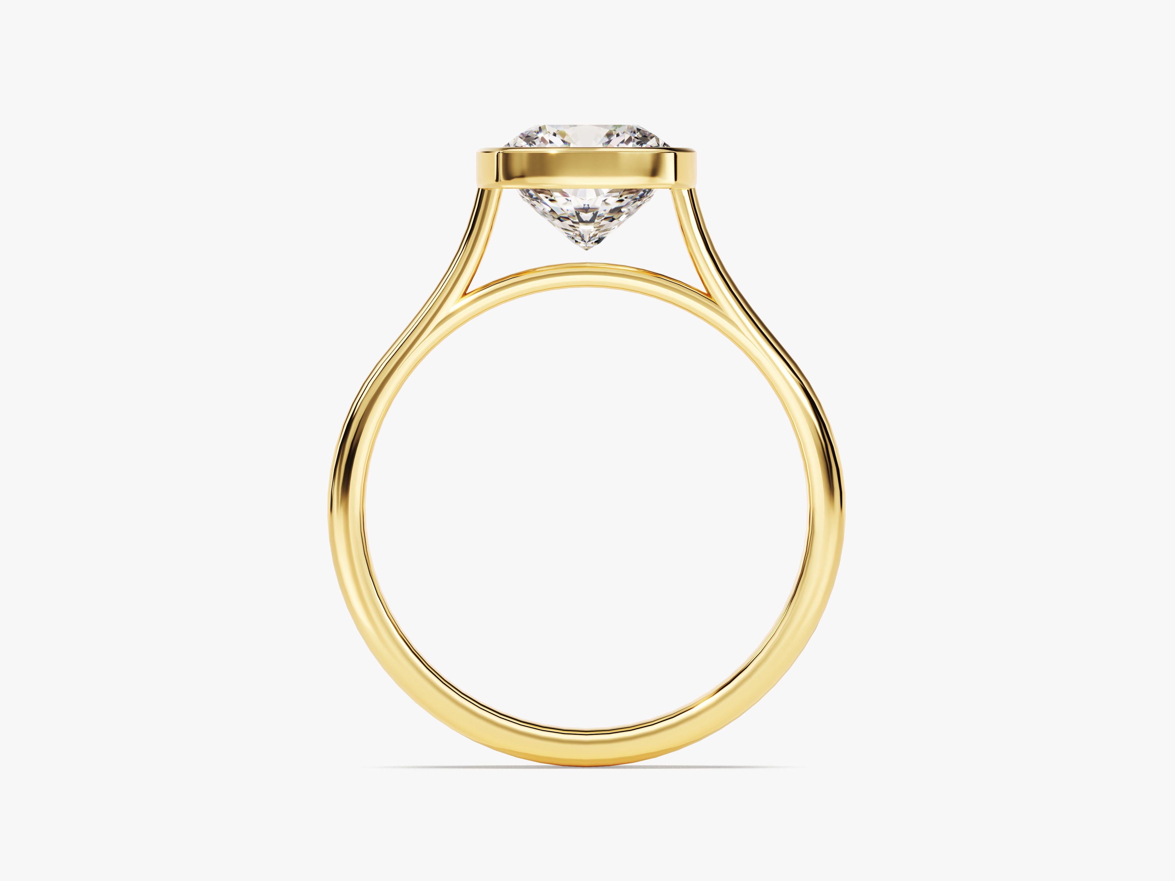Gold ring with a bezel-set diamond, elegant jewelry design