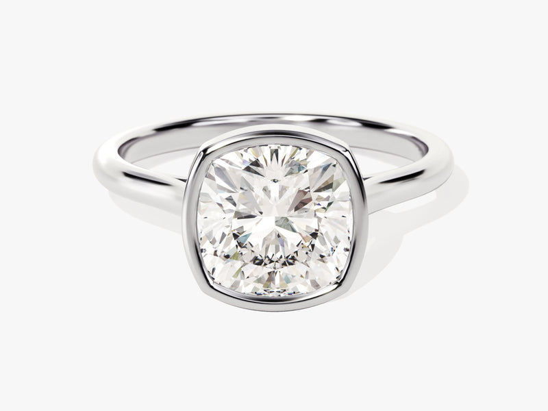 Cushion cut diamond engagement ring with bezel setting