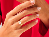 Gold ring with cushion-cut diamond on hand, jewelry photography