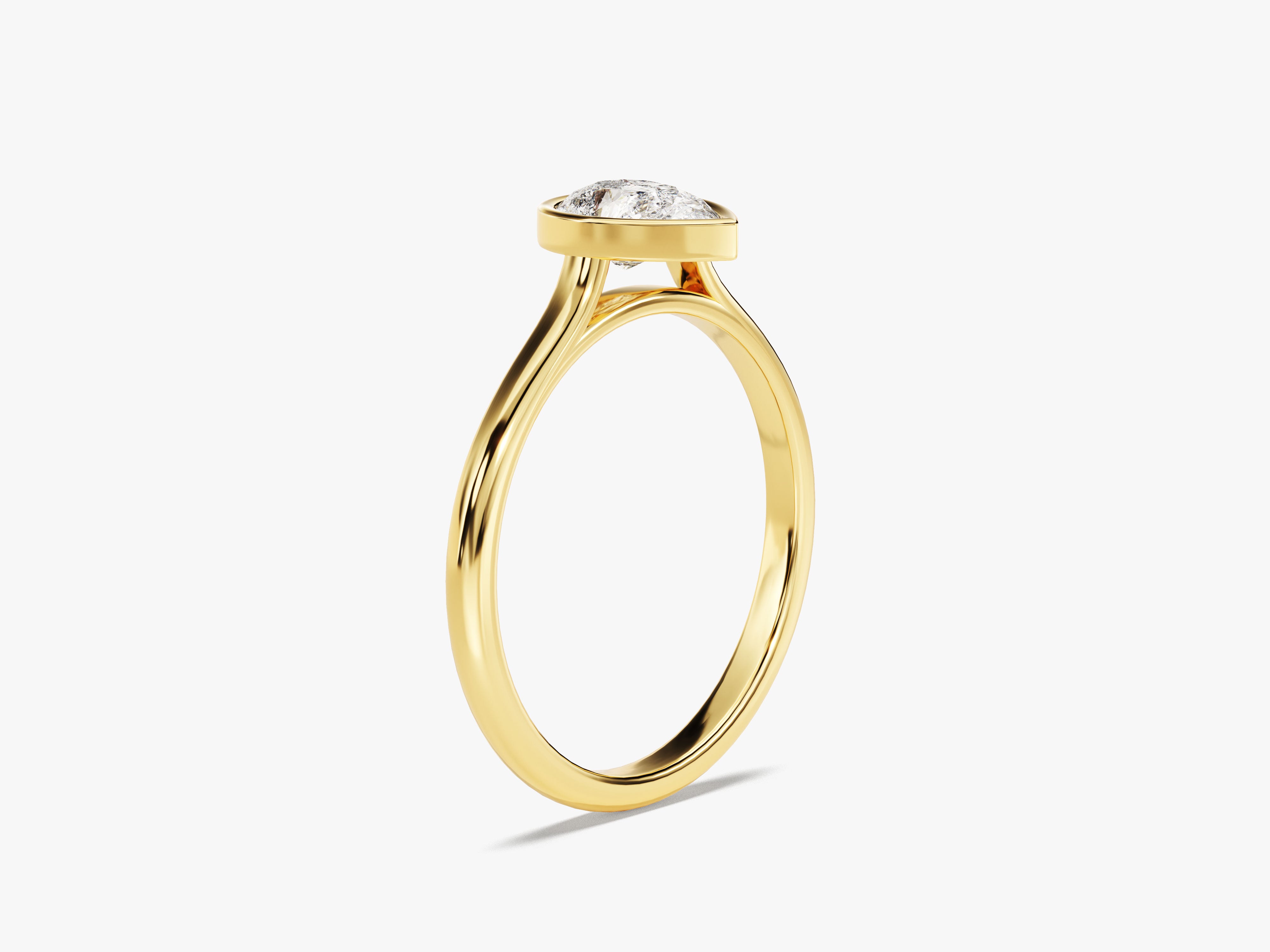 Gold ring with bezel-set diamond, fine jewelry