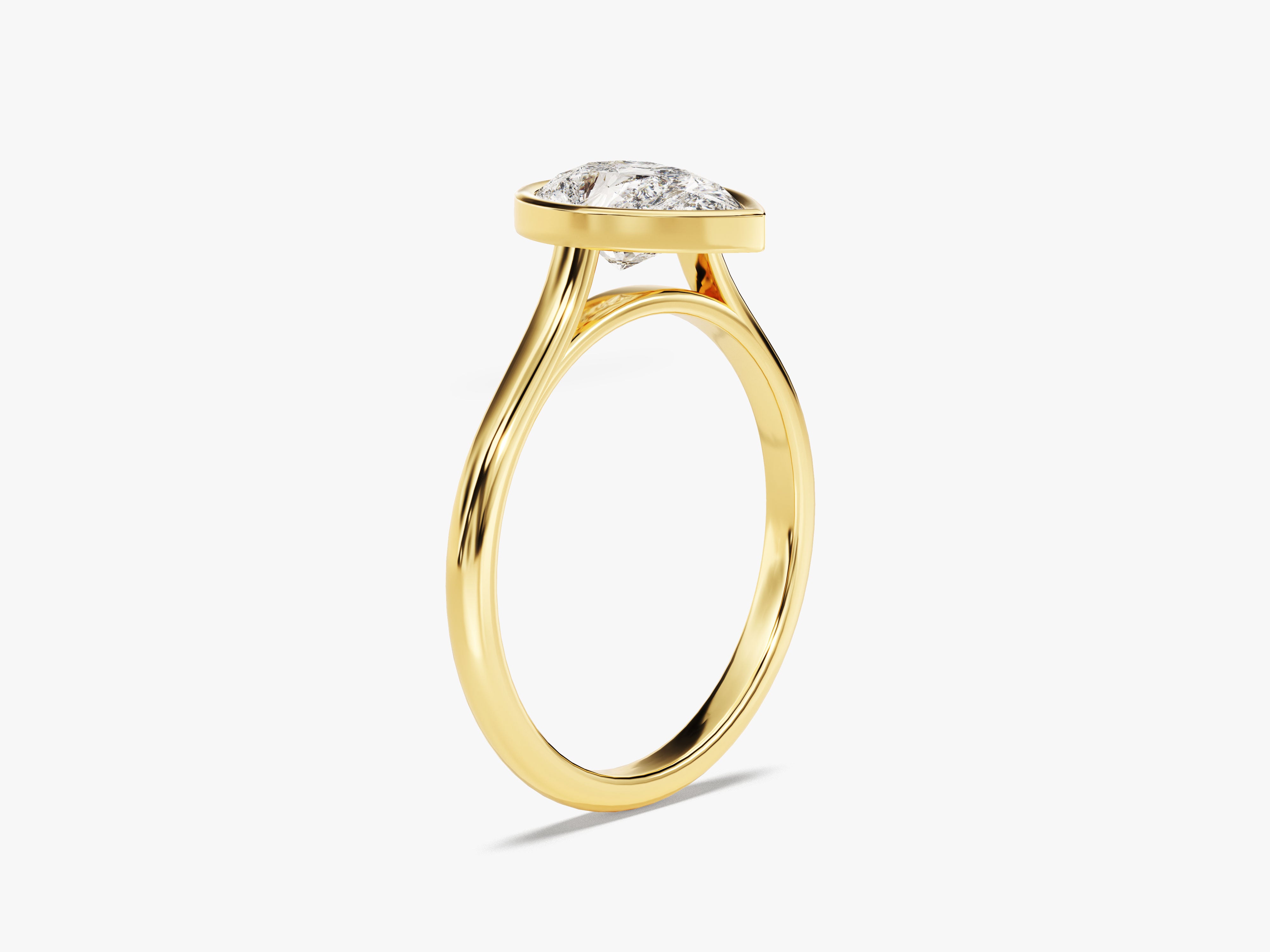 Gold ring with bezel-set diamond, fine jewelry