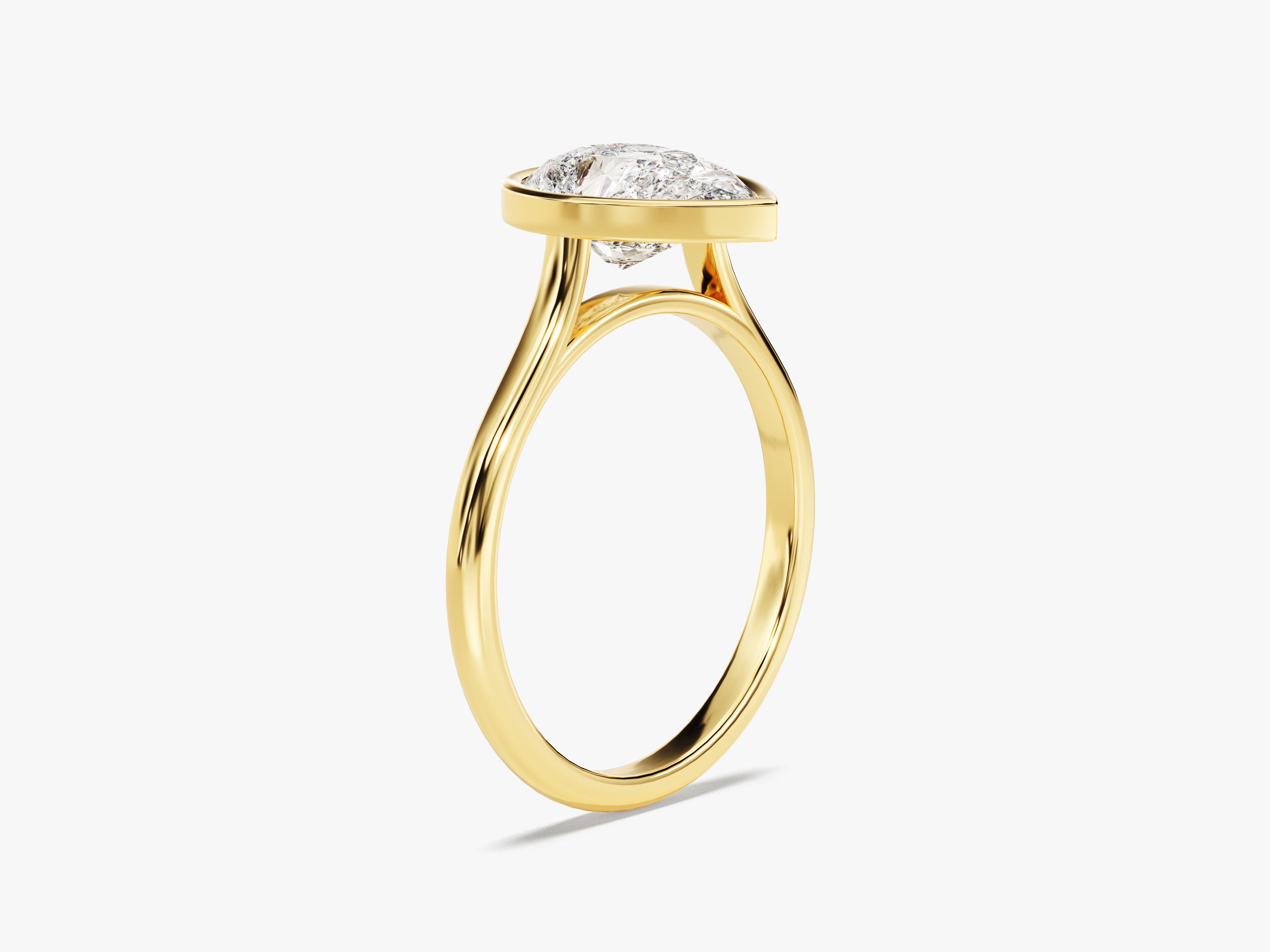 Gold ring with a bezel-set diamond, fine jewelry