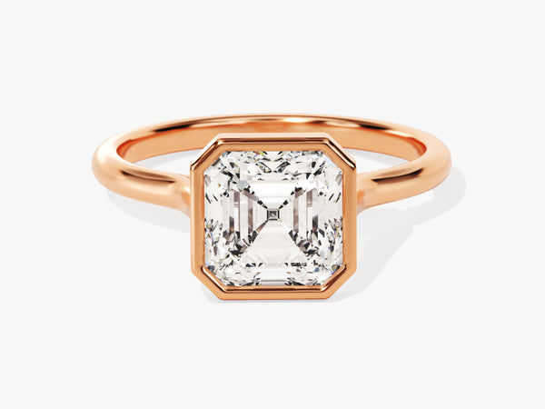 Rose gold ring with emerald cut diamond bezel setting