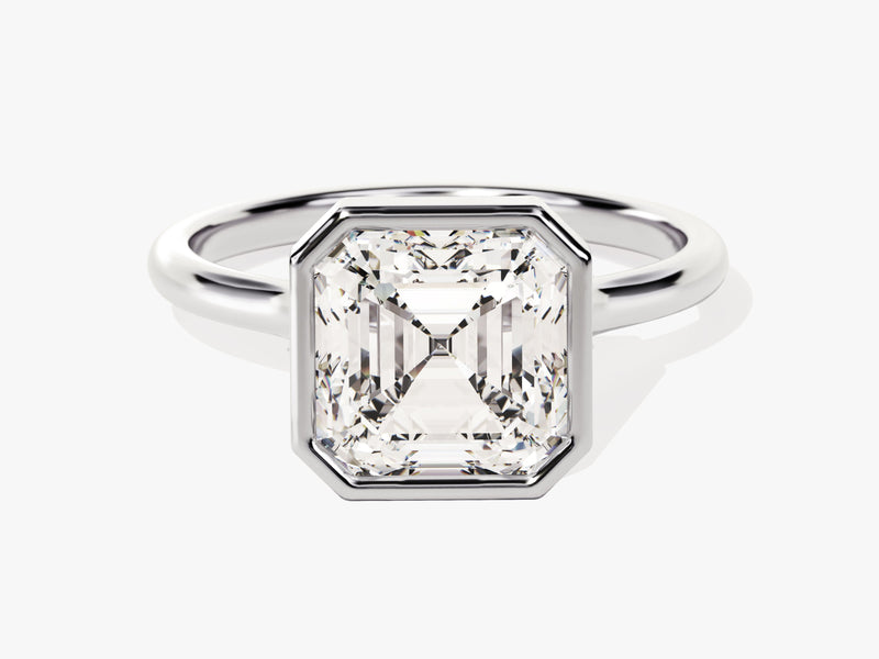Emerald cut diamond ring in a bezel setting