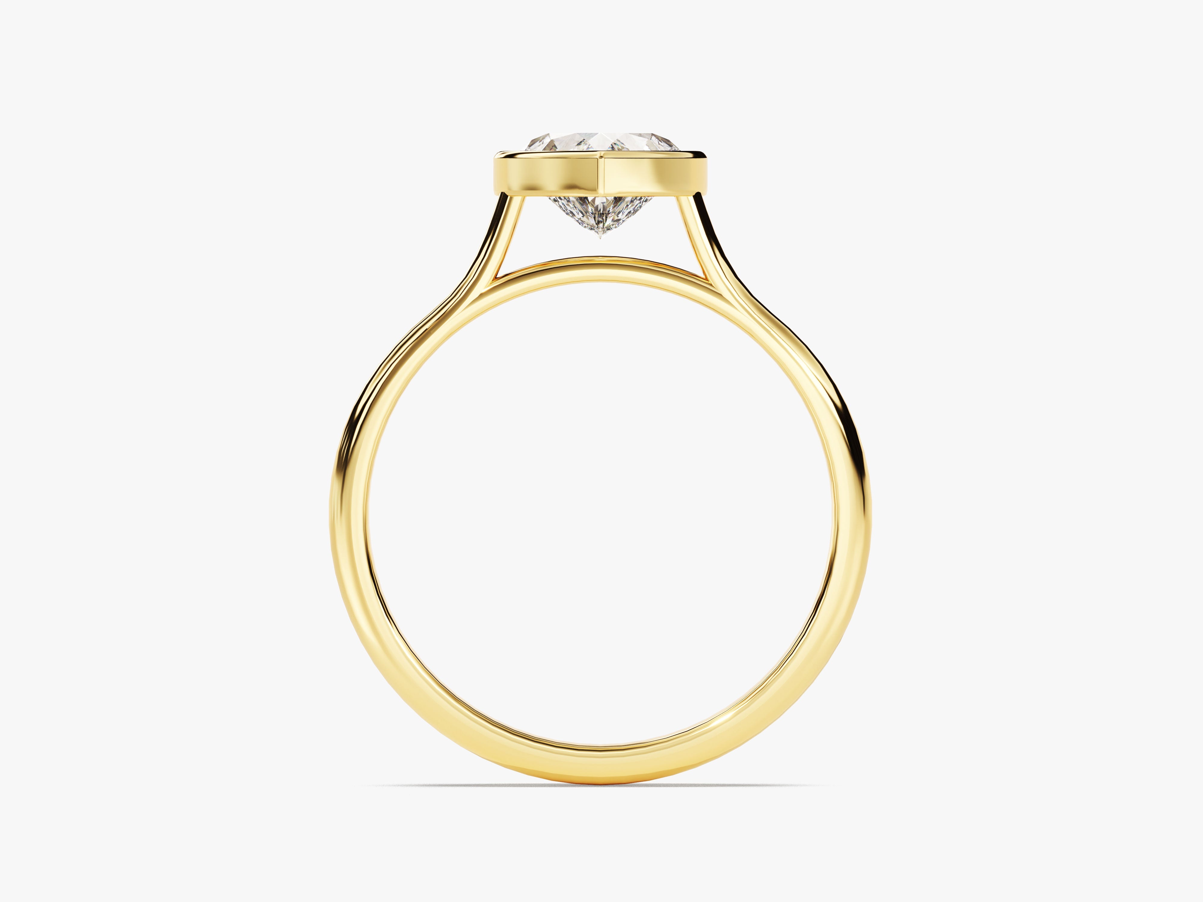 Gold ring with a bezel-set diamond, fine jewelry
