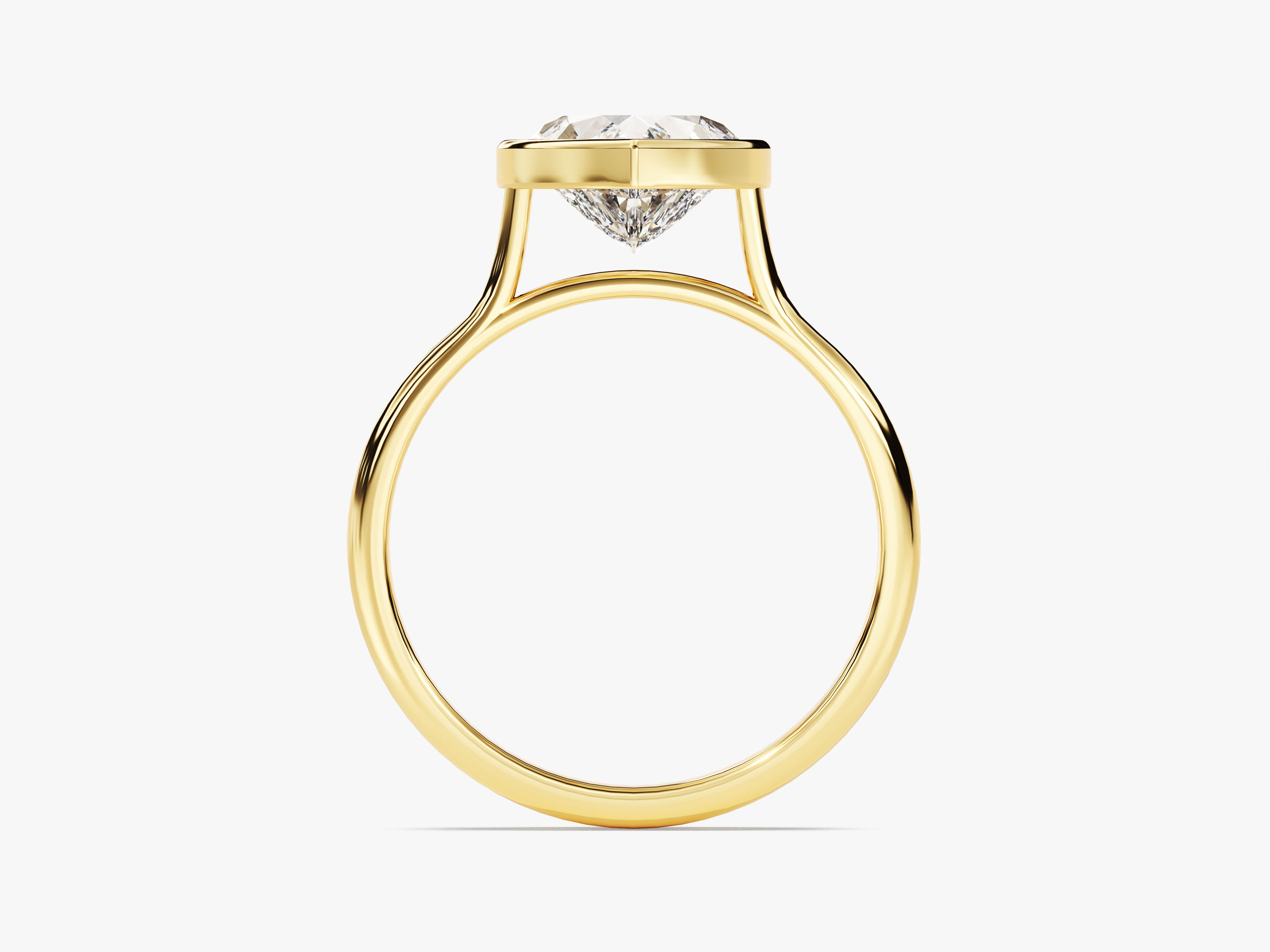 Gold ring with a bezel-set diamond, fine jewelry