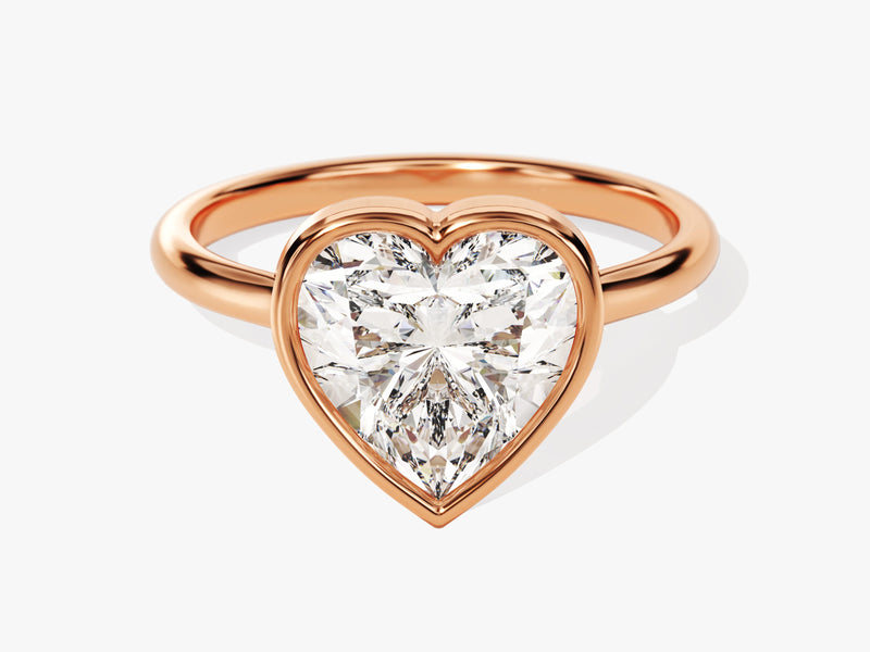 Rose gold ring with a heart-shaped diamond engagement ring