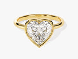 Gold ring with a heart-shaped diamond engagement ring