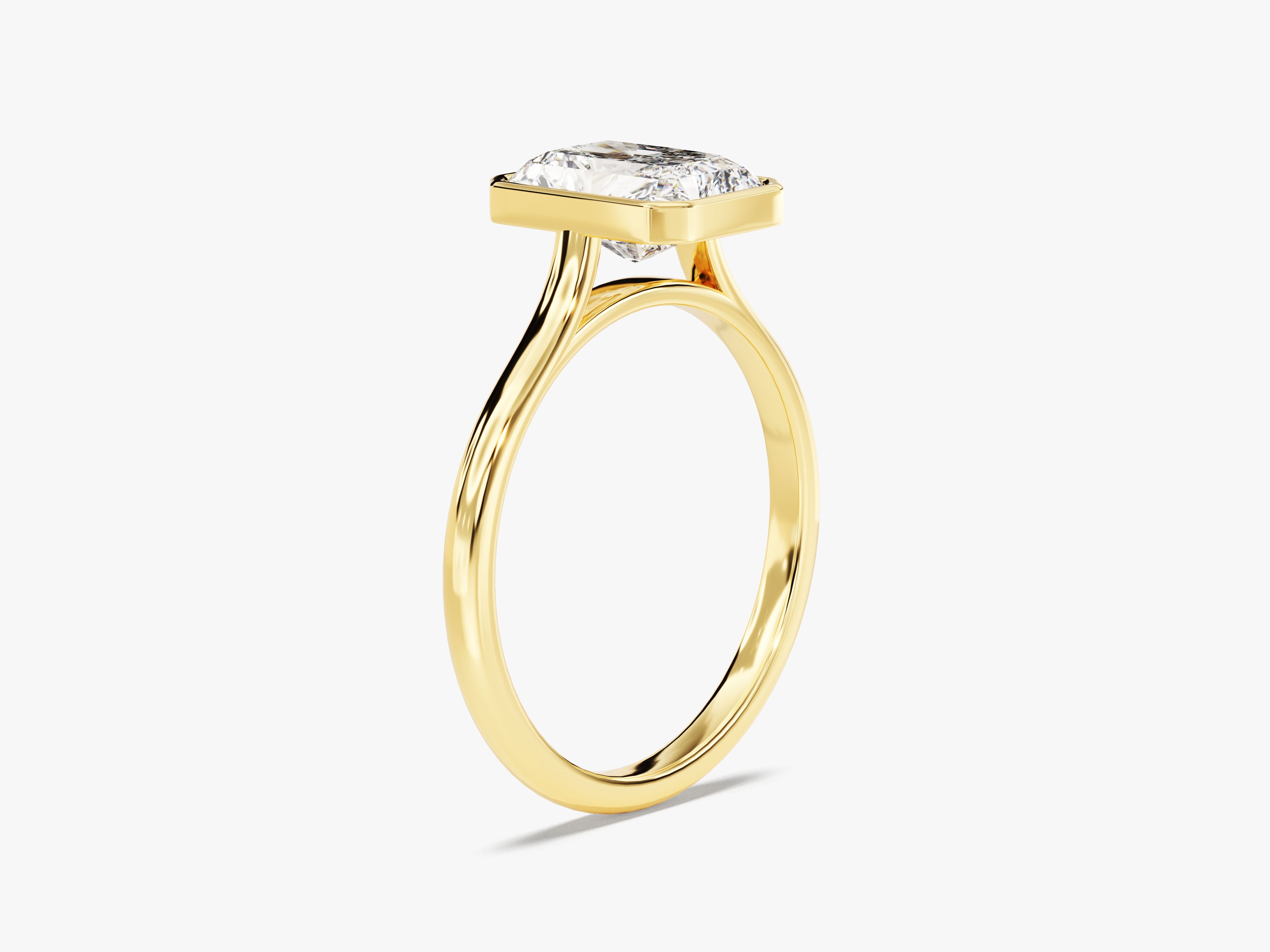 Gold ring with a radiant diamond solitaire setting