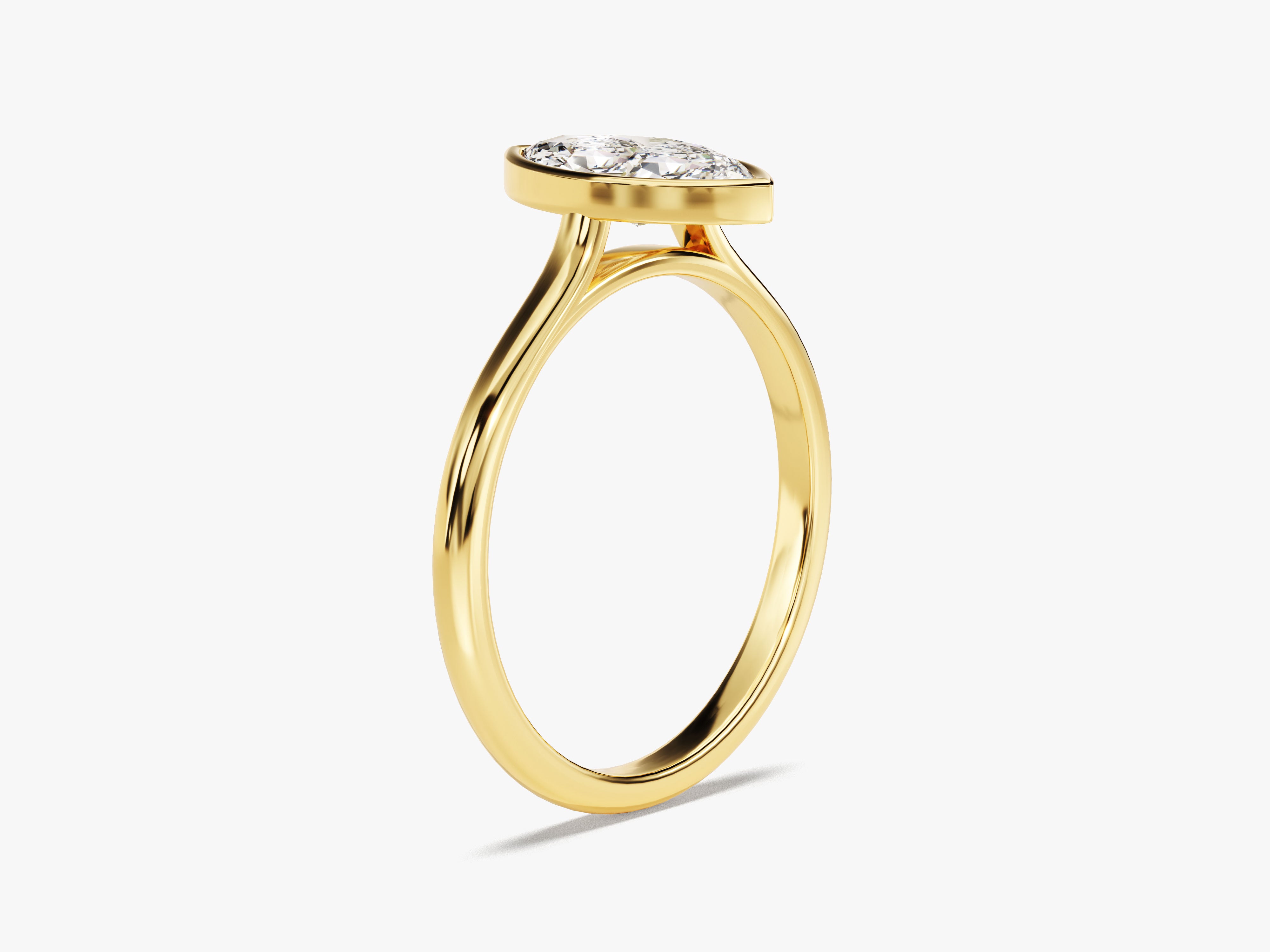 Gold ring with bezel-set marquise diamond engagement ring