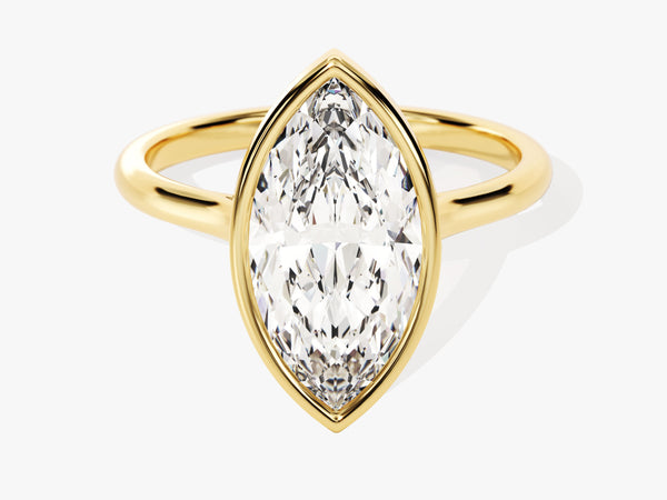 Gold ring with a marquise cut diamond engagement ring