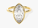 Marquise diamond engagement ring in gold bezel setting