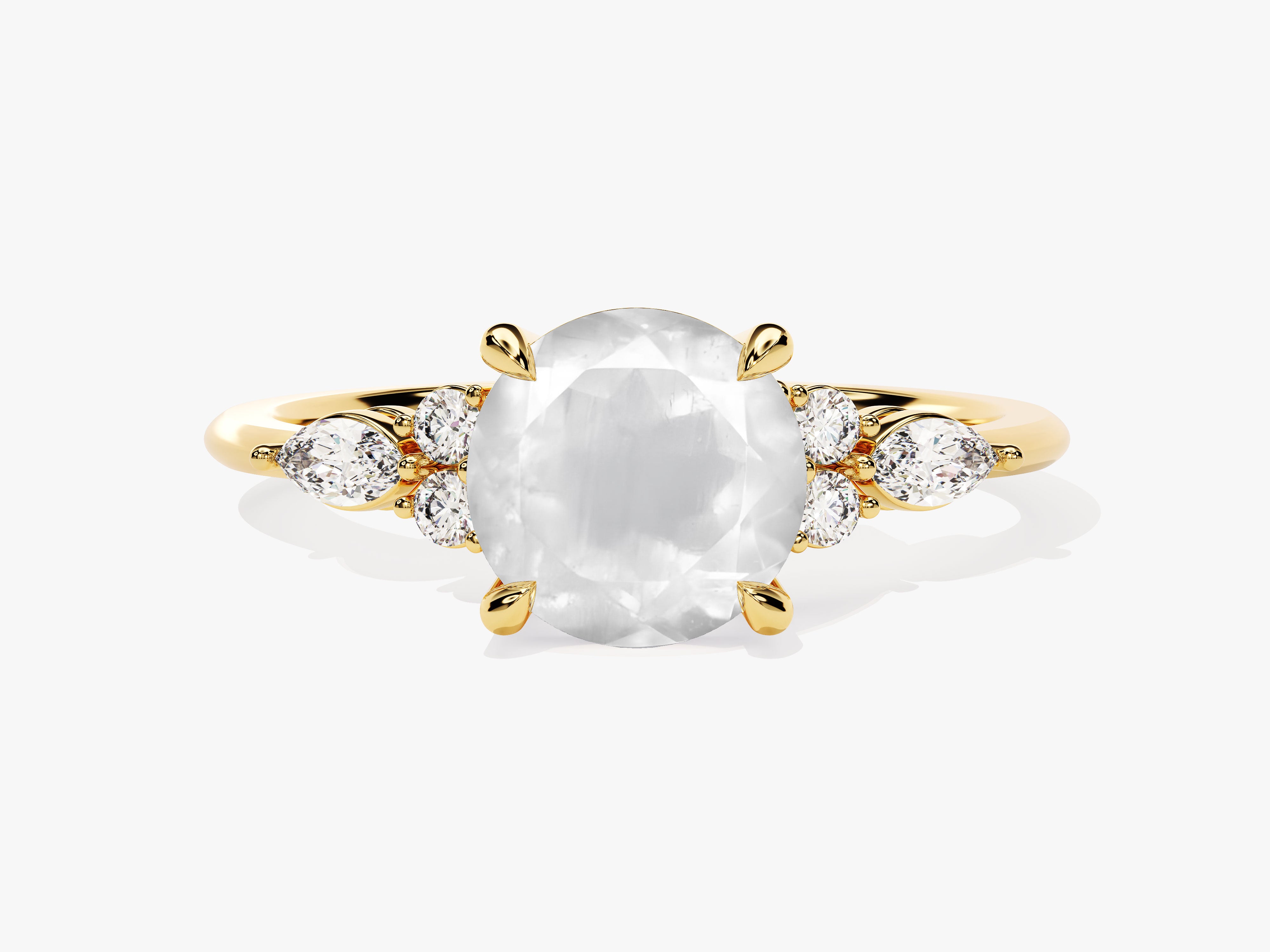 Oval moonstone ring with diamonds on a gold band