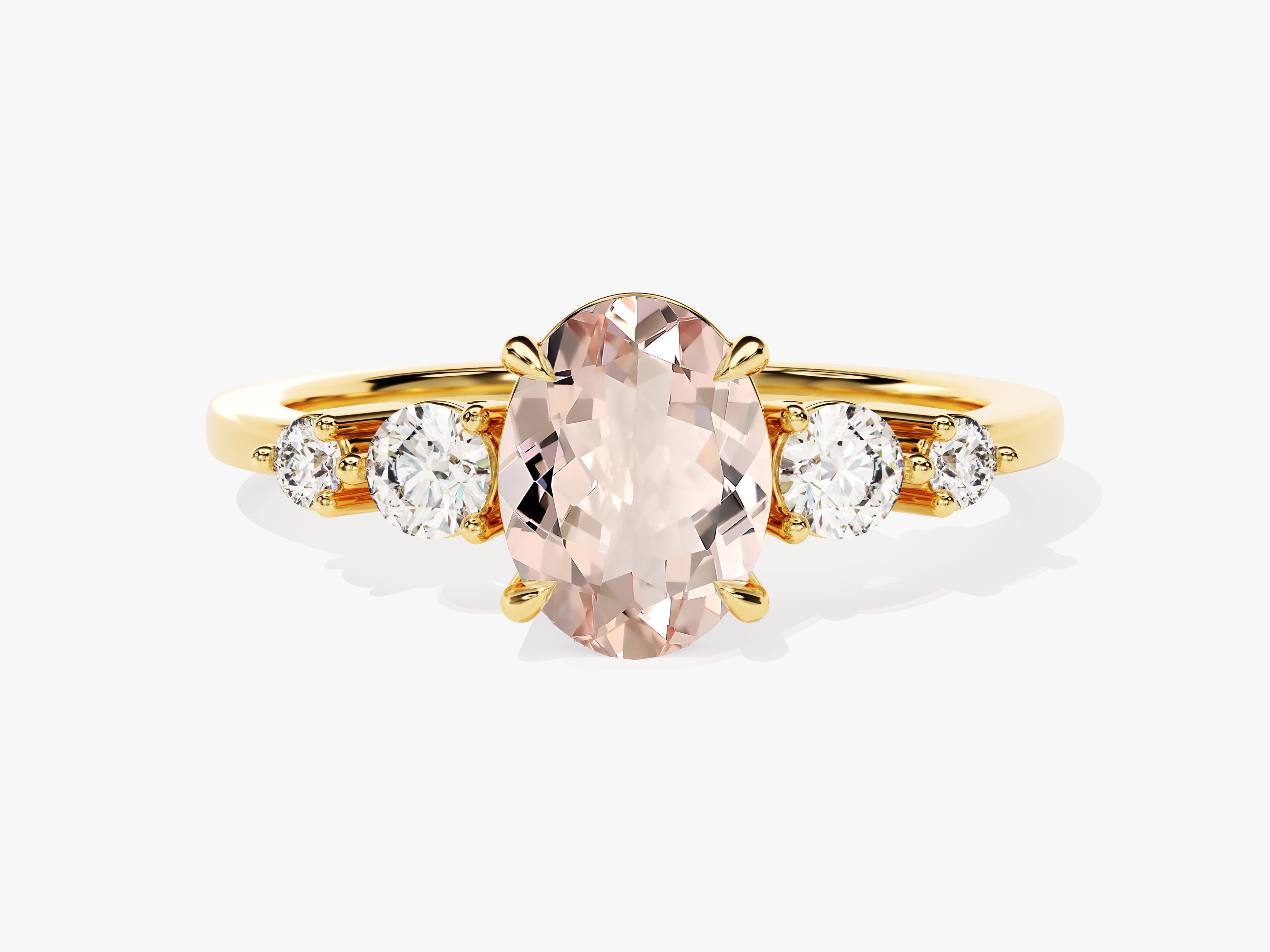 Gold ring with oval morganite and diamonds