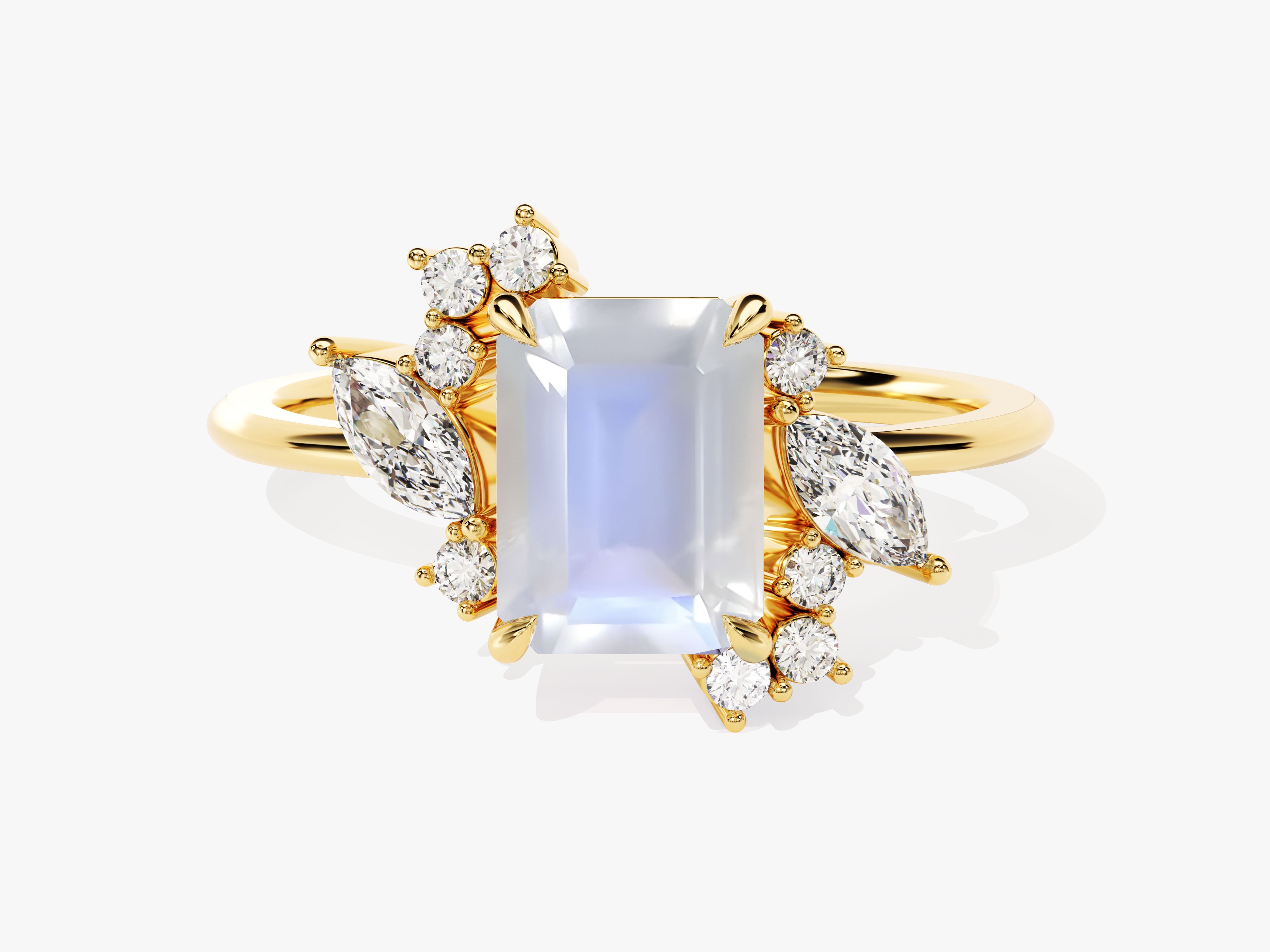 Gold ring with emerald cut moonstone and diamonds