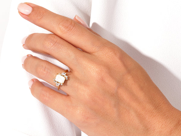 Emerald Cut Moonstone Engagement Ring with Marquise and Round Moissanite Sidestones