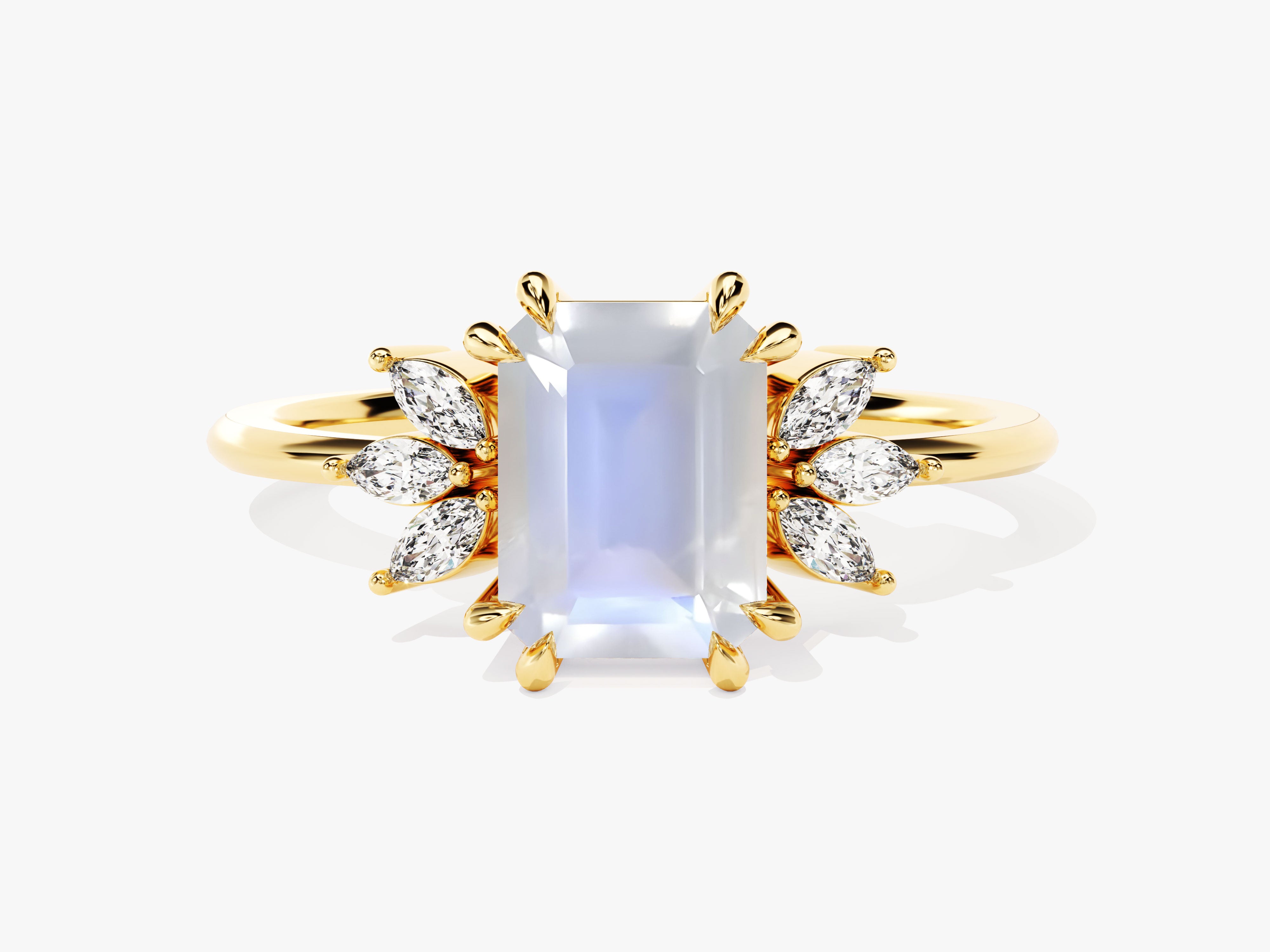 Gold ring with emerald cut moonstone and diamond accents