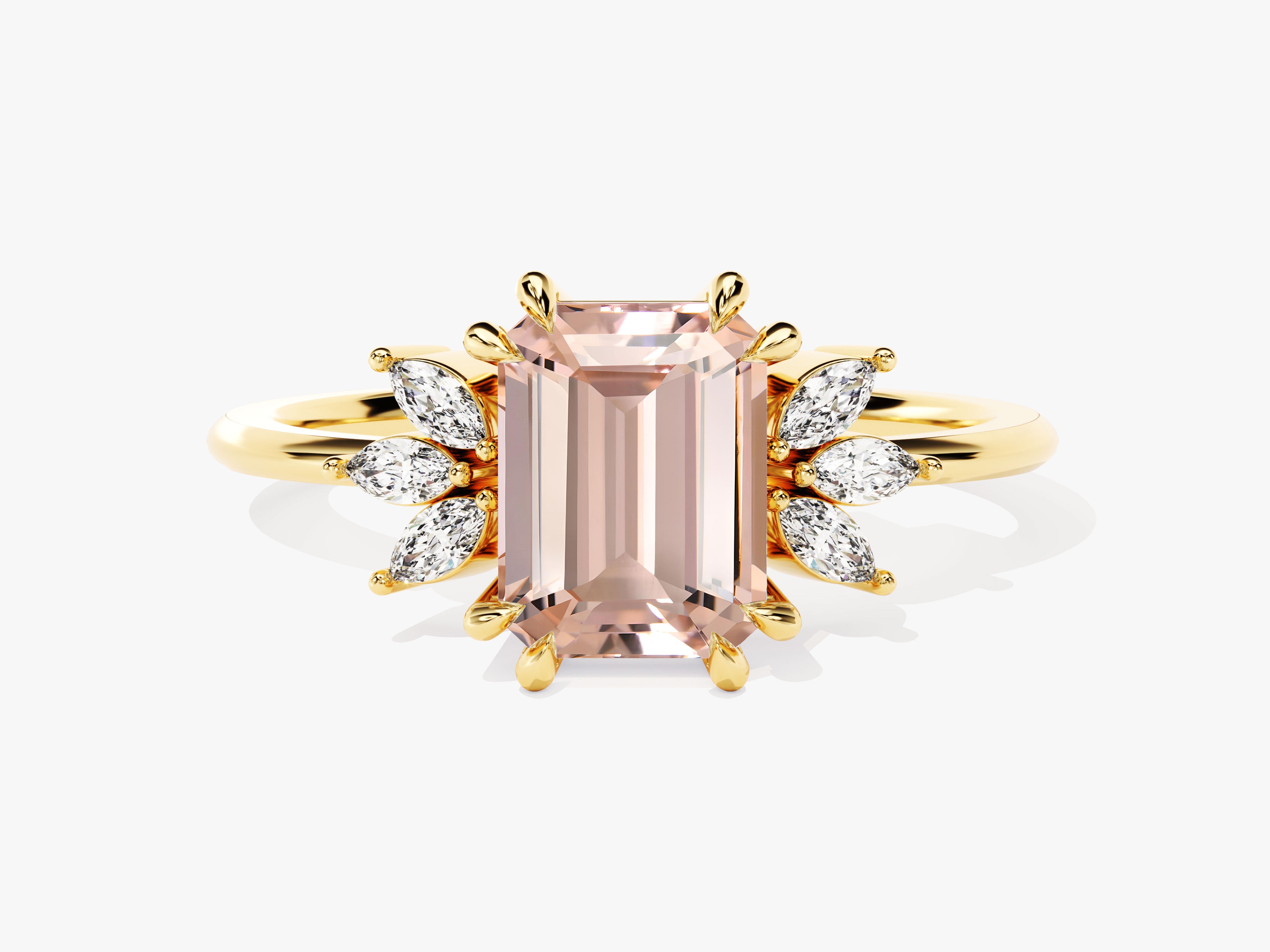 Emerald cut morganite ring with diamond accents on gold band